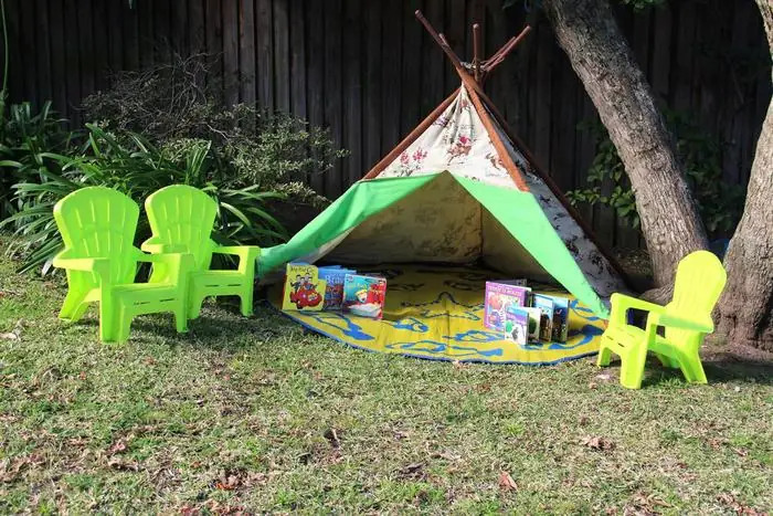 Quiet reading nook with teepee and children's books