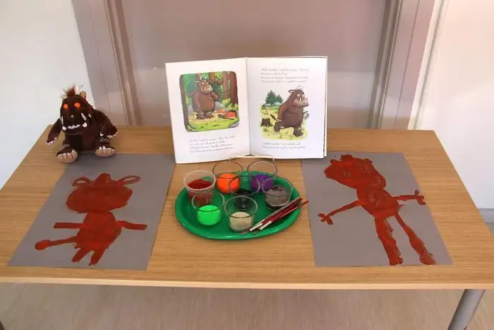 Art invitation on a classroom table